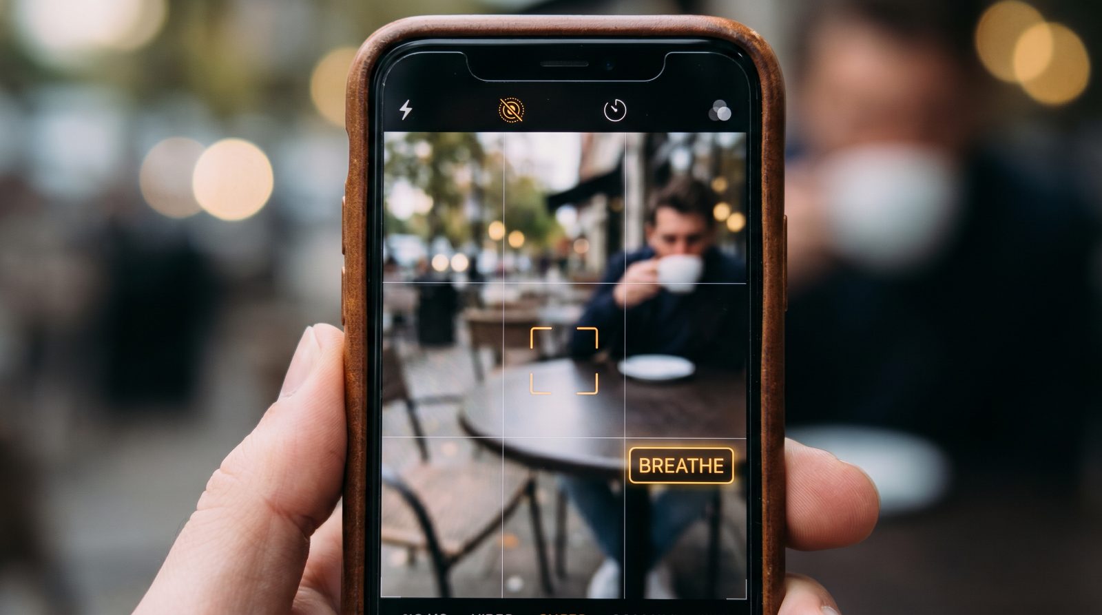 Pix Camera AI viewfinder with focus brackets and a live coaching cue